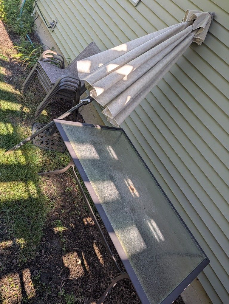 Free Table, Umbrella w/ stand And Four Chairs 