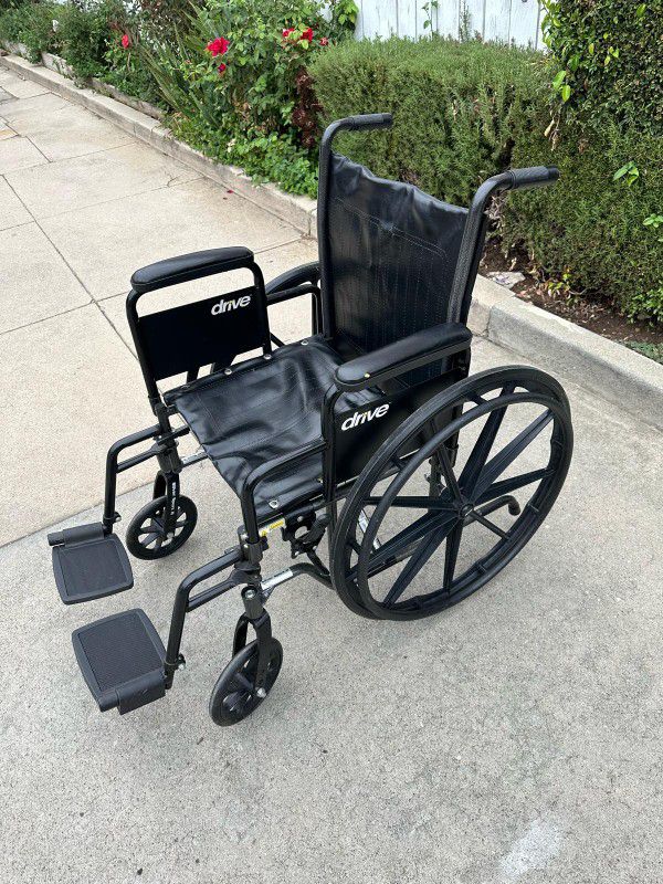 16 Inches Wide Wheelchair In Excellent Condition Easy To Fold 