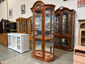 PULASKI Arch Top Illuminated Curio Cabinet with Mirrored Back and False Key Handle