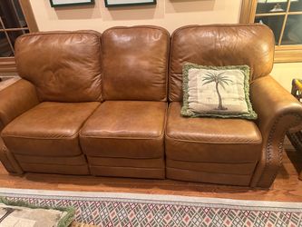 Tan Leather Reclining Sofa with Nailhead Trim