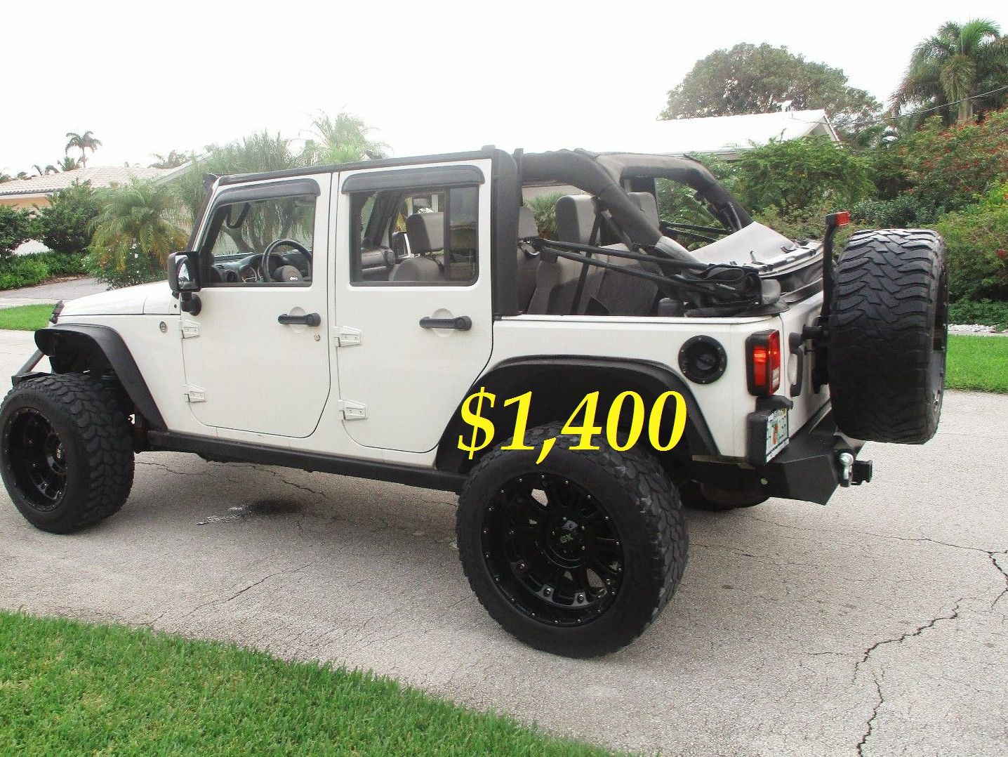 🍁$1,4OO FOR SALE 2010 JEEP WRANGLER 6 CYL 4X4 LIFTED WITH RIMS CLEAN.🍁
