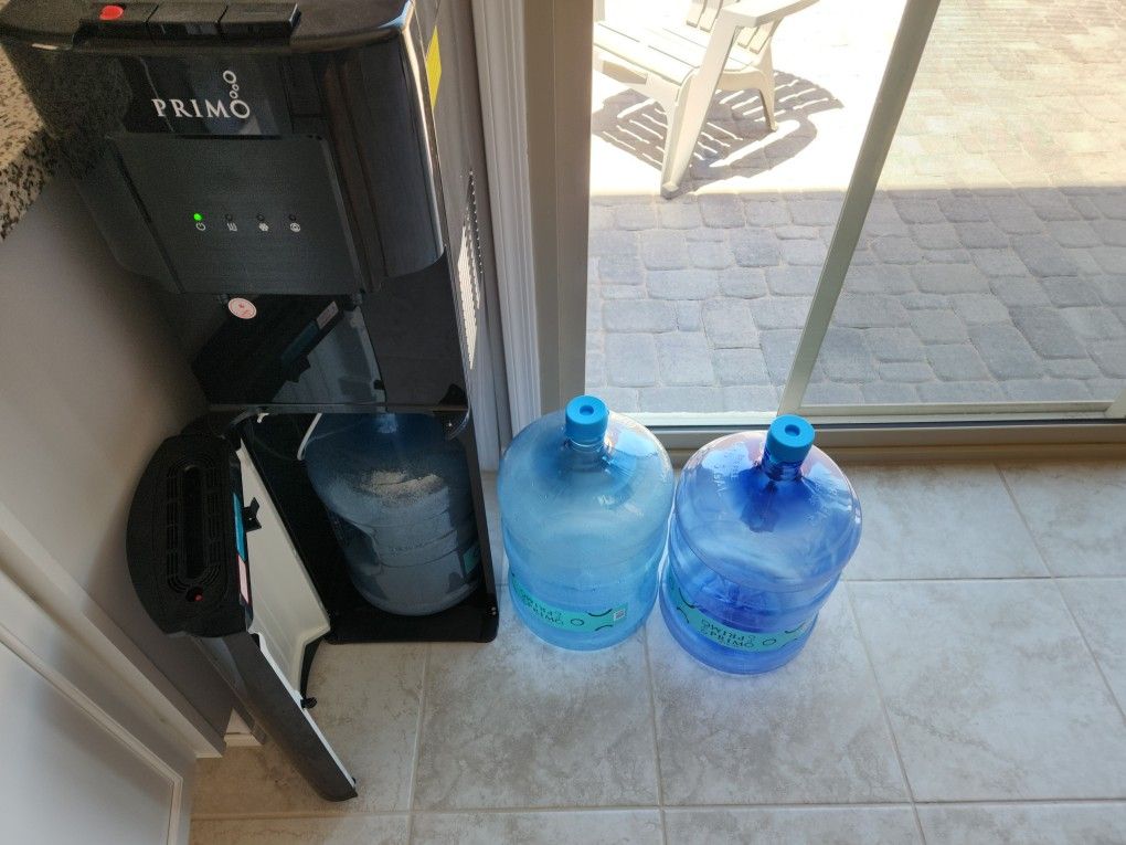 Primo Water Dispenser And 5 Gallon Jugs for Sale in Sun City, AZ OfferUp