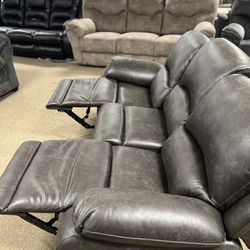 Stunning Theater Reclining Couch and Loveseat 