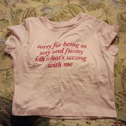 Brandnew pink top with worded phrase 10 bucks or best offer