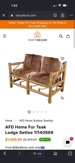 Ornate log patio set covered cushions