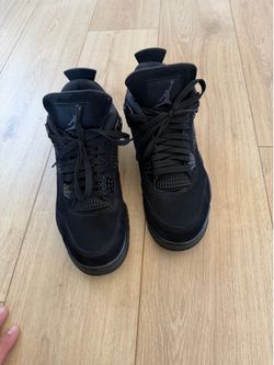 Black cat Air Jordan 4s