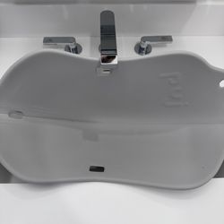 Puj – Puj Flyte Compact Infant Bathtub, Baby Bathtub for Newborns and Infants, Stylish Baby Bath Essentials for Home and Travel, 23.5 x 10.51 x 1.5 in