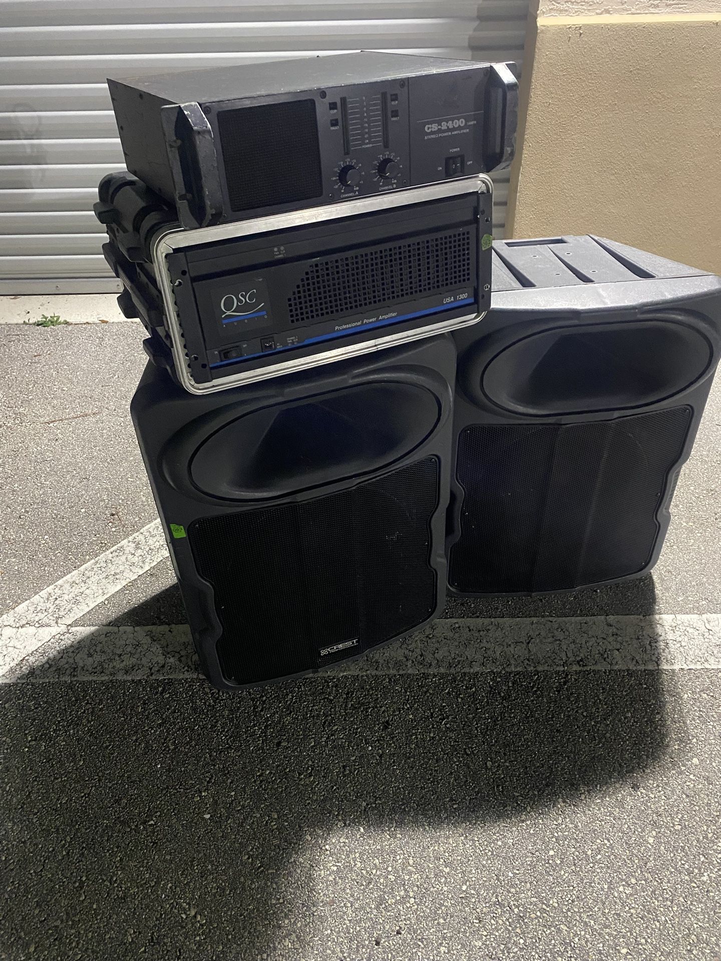 Two AMP one QSC professional power amplifier USA 1300, the other AMP is CS-2400 power amplifier and two CREST AUDIO LQ 15 speakers system for the four