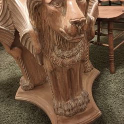 Solid wood lion table with glass top and four chairs