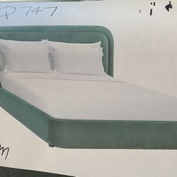 New Queen size platform bed green fabric upholstered.