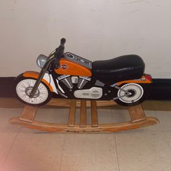 This is a Charm Company Harley-Davidson Roaring Softail Rocker, a children's rocking toy designed to resemble a Harley-Davidson motorcycle. It is made