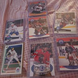 Six hockey cards one baseball card
