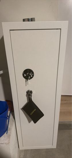 white KAER rifle safe / cabinet