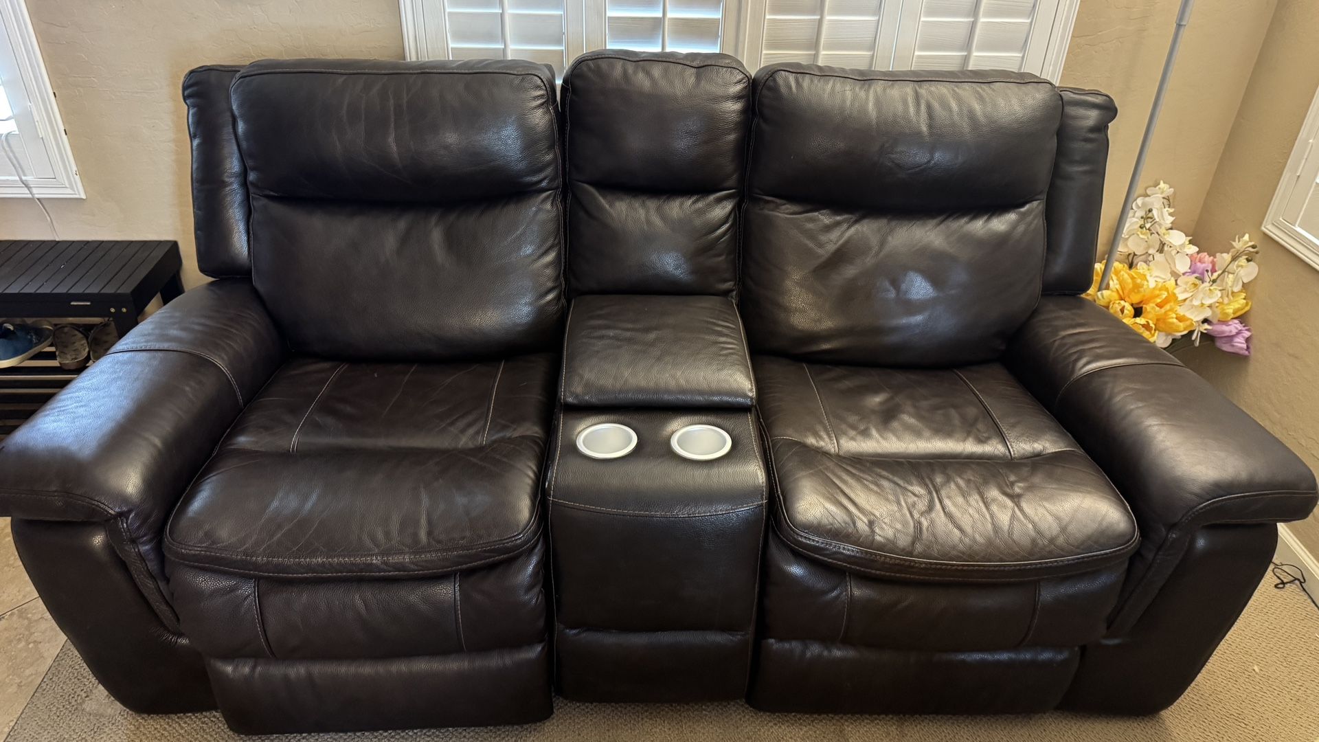 Dark Brown Leather Dual Power Reclining Loveseat with Console, USB Charging, and Cup Holders – Both seats recline with independent power footrests