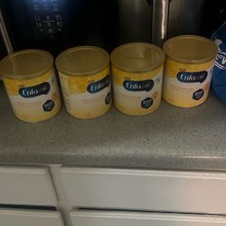 4 Yellow Cans Of Enfamil 