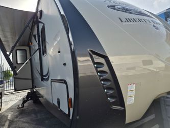 Rv travel trailer 32ft  two rooms 13k