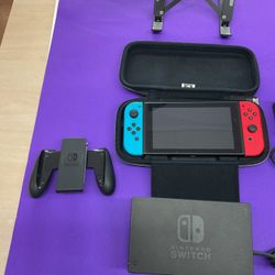 Nintendo Switch Console (Neon Red/Blue) with Dock, Joy-Con Grip, Charger, HDMI & Carrying Case – Complete Set