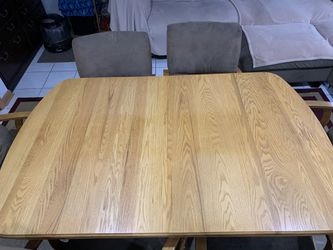 Solid Wood Table and 6 comfy chairs