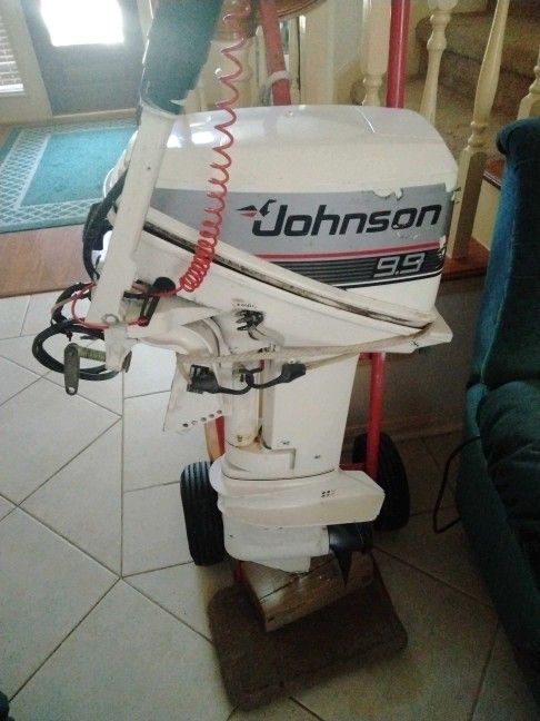 1998 Johnson 9.9 HP OUTBOARD MOTOR WITH ELECTRIC START. ((Clean Title