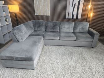 Gray Velvet 2 Piece Sectional With Nailhead Trim Detailing on the armrest
