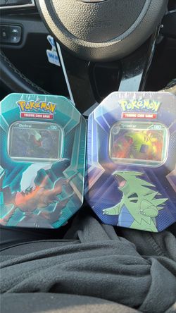 Darkrai and tyranitar Pokemon tins