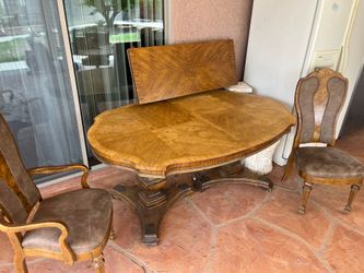 Wood dining table.  With chairs and china hutch