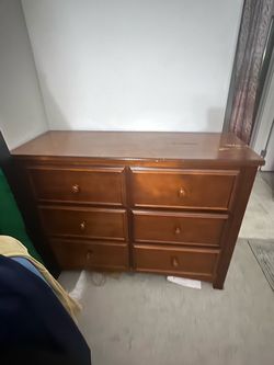 6-drawer wooden dresser , Mirror, basket or jewelry organizer for ($20)
