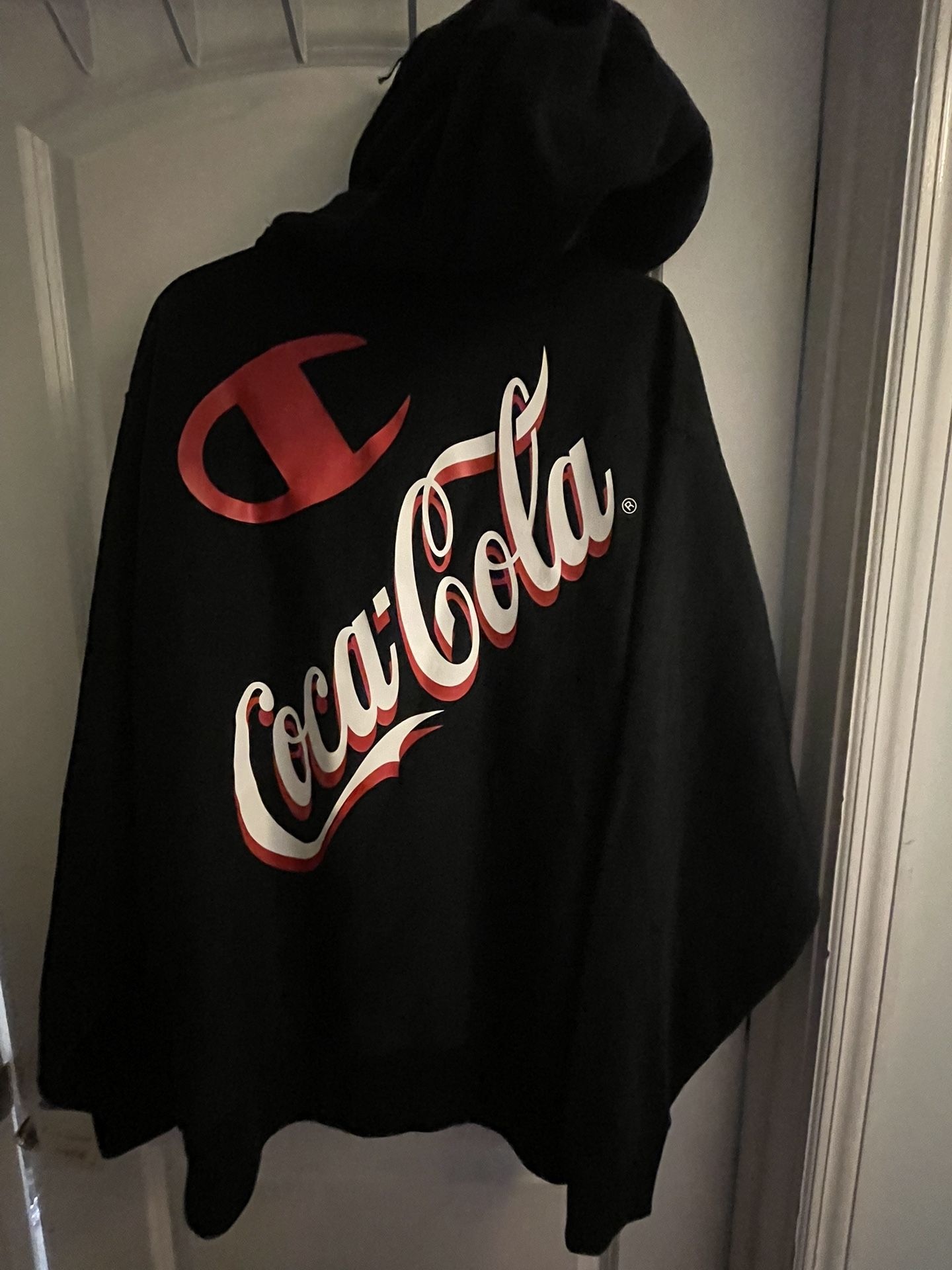New w/tag Men’s black Champion Coca-Cola hoodie size 2 XL. In East Orange or Jersey City