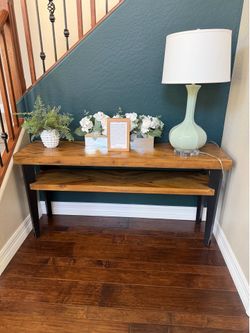 Beautiful entrance table with herringbone wood design