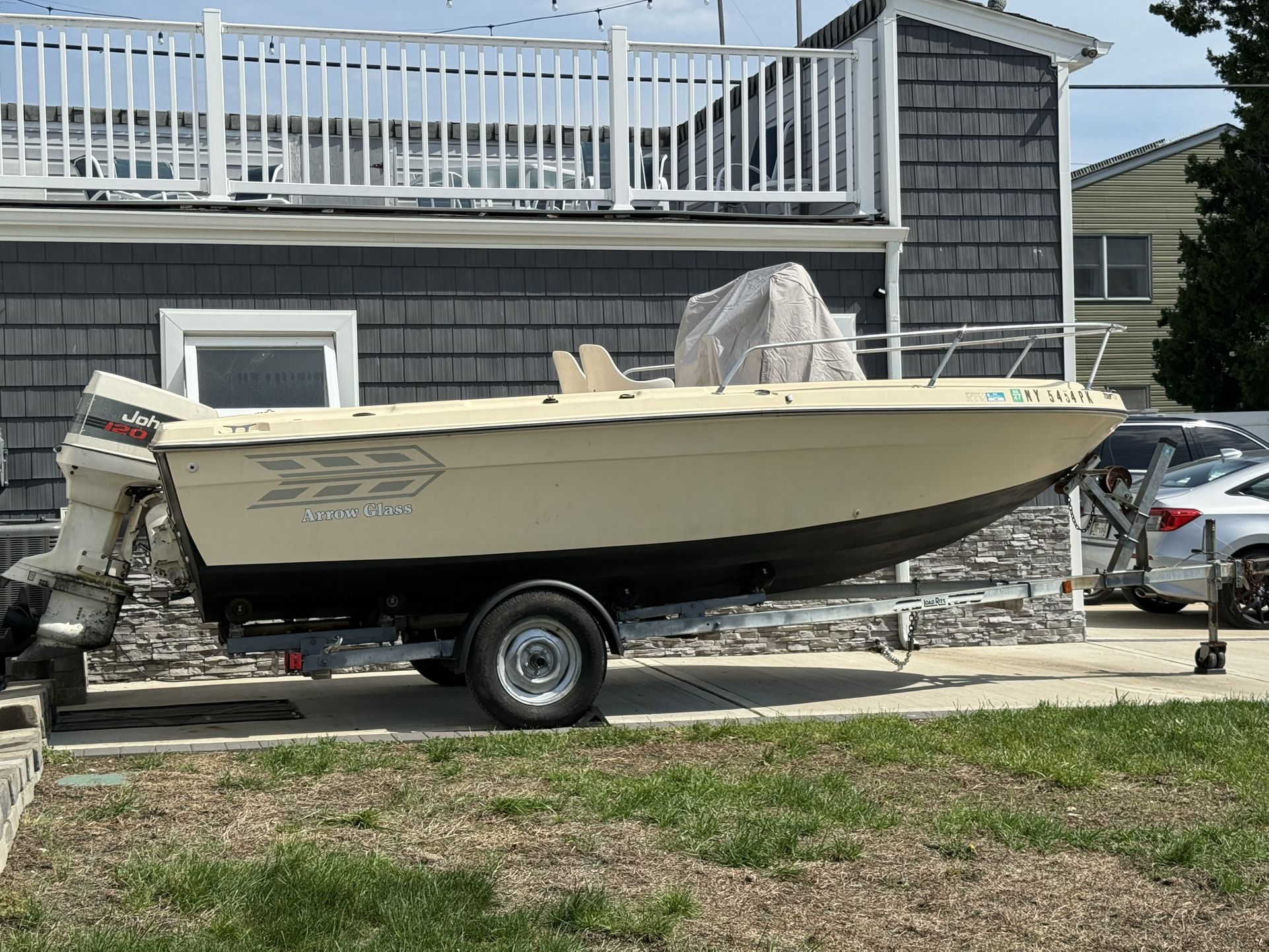 18 foot center console arrow center console fishing boat with Johnson 120 outboard. trailer included