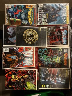 17 Comic Books In Wrap And Good Condition