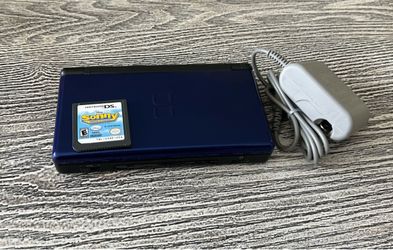 Nintendo DS with a game, complete with charger. $55