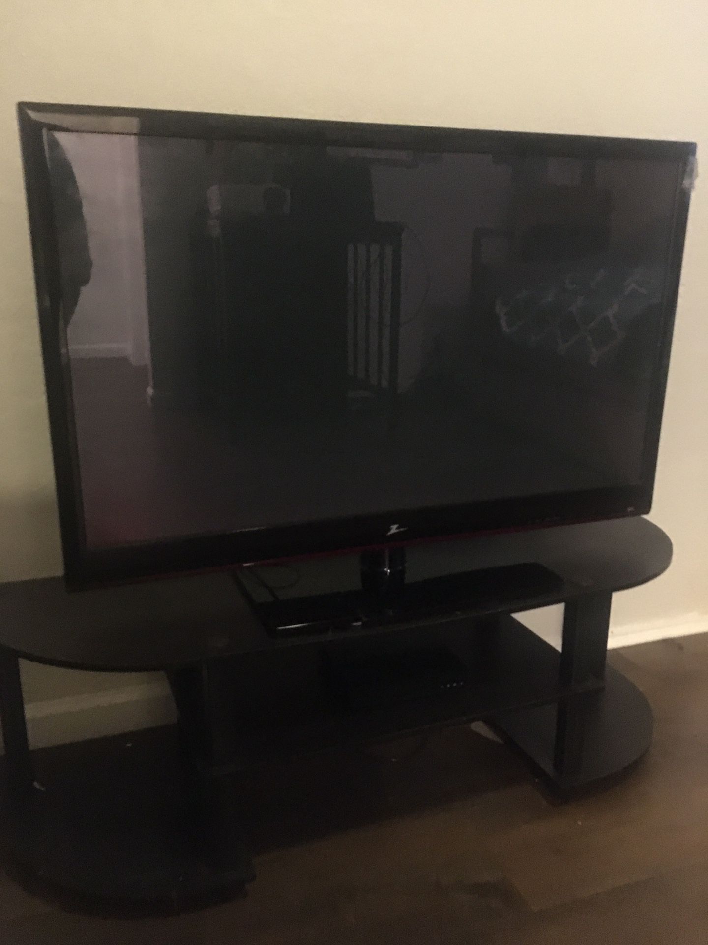 42 inch flatscreen with tv stand and DVD player