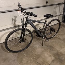 Redline Commuter/Gravel Adult Dual Bike 700x38C Tires, Disc Brakes, Front Fork Hydraulic Lock