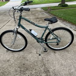 Novara Juant  L/XL beach cruiser bicycle  Shimano gears front suspension excellent condition  This bike rides really smooth, soft grips, plush seat. 1