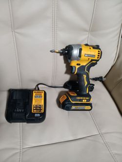 DEWALT IMPACT DRILL WITH BATTERY AND CHARGER .