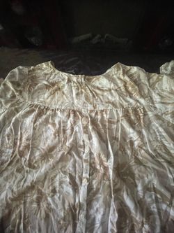 Used Women’s Cream floral shirt size 30/32