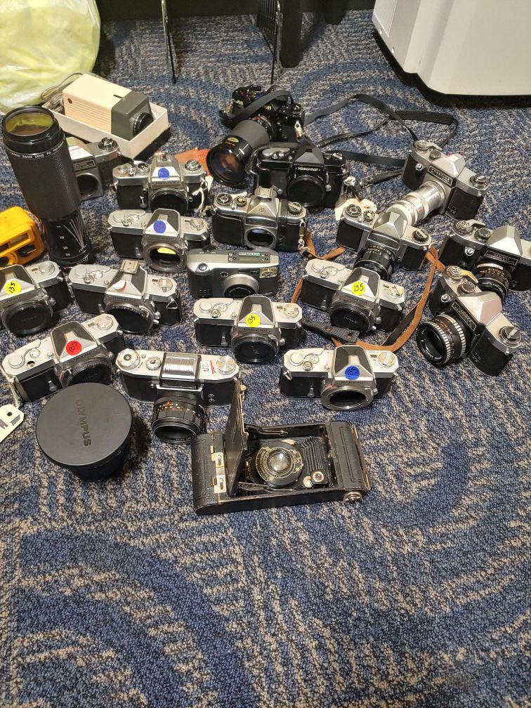 Assorted film cameras and lences