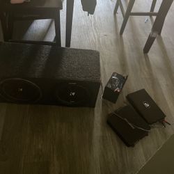 Two 12’s Speakers A Amp For Bass And Amp For Hive And A Battery Also Have Equalizer And Power Battery 