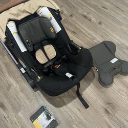 Doona Convertible Infant Car Seat/ Compact Stroller System with Base + Leather Handlebar Cover