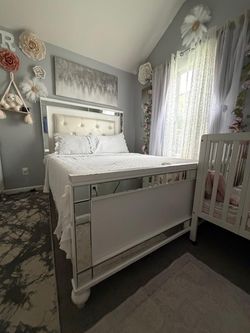 Queen bed with a nightstand