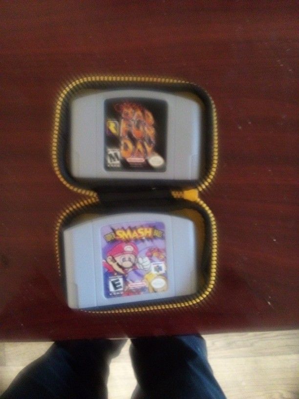 Nintendo 64 Games One Is Mario Smash The Other Is Coalcers Bad FurA Day