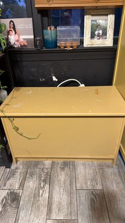 Dark yellow/light brown storage container wood