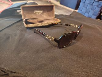 These are the Coach L111 (Model HC8140) women's sunglasses.