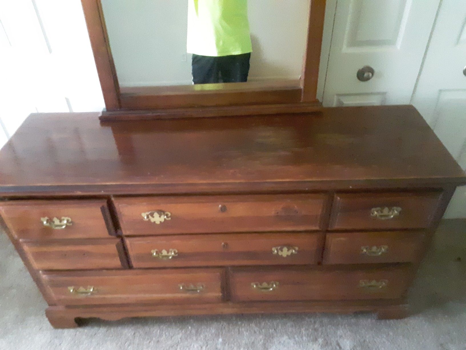 Solid wood dresser with attached mirror