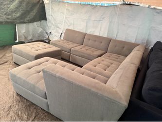 Grey Couch great condition clean we fell all the time delivery $40 local