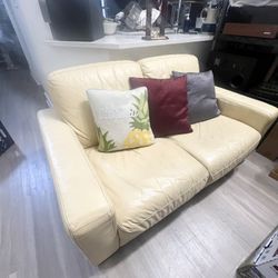 YELLOW LEATHER SOFA .