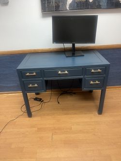 Custom painted desk from Nigel’s Los Angeles navy blue