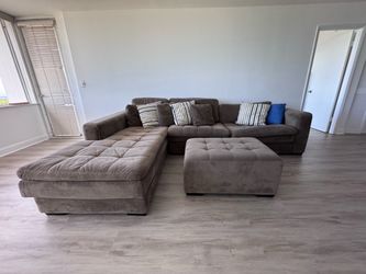 Large L-shaped sectional sofa with chaise + ottoman
