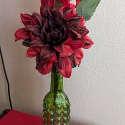 Red Flowers In Green Glass Vase